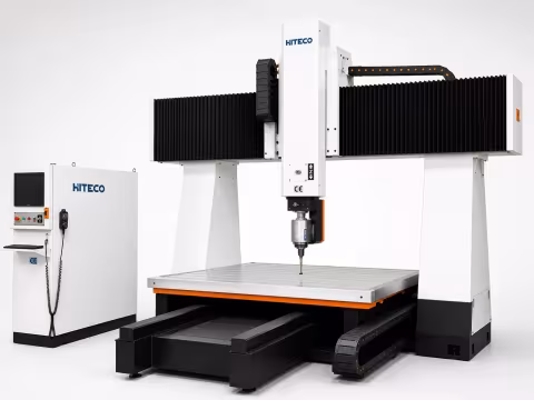 A 5-axis CNC machine working on a complex part