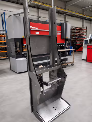 The first metal enclosure in front of the AMADA HG 1003